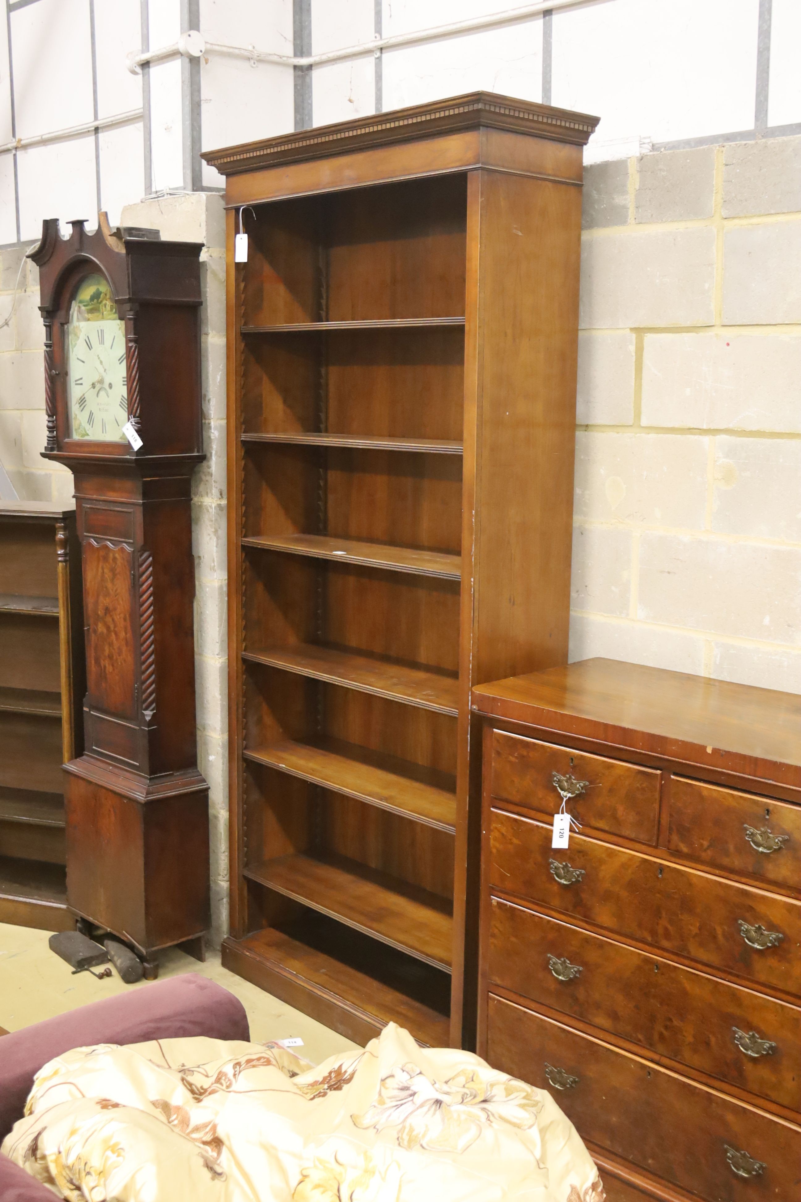A reproduction mahogany open bookcase, length 102cm, depth 33cm, height 229cm
